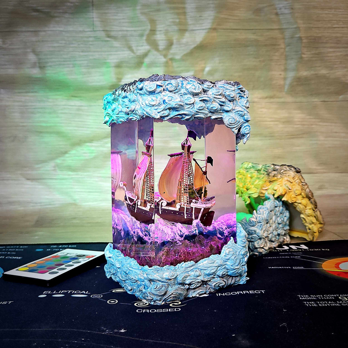 Going Merry Resin Lamp V2 display shot, One Piece scene suspended in clear resin with LED base light