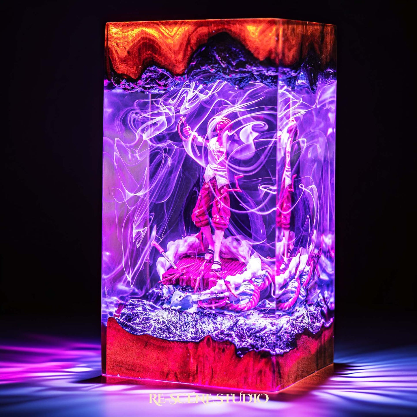 Red-haired pirate emperor with arm raised on a ship handmade epoxy resin LED lamp on a wooden base – size and scale view