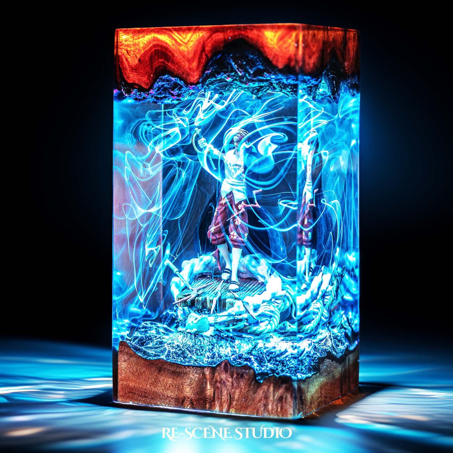 Red-haired pirate emperor with arm raised on a ship handmade epoxy resin LED lamp on a wooden base – RGB color glow in a dark room