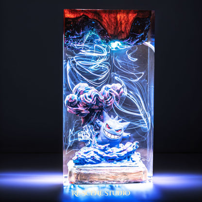 Grinning shadow phantom with a looming dark silhouette handmade epoxy resin LED lamp on a wooden base – front view, lit