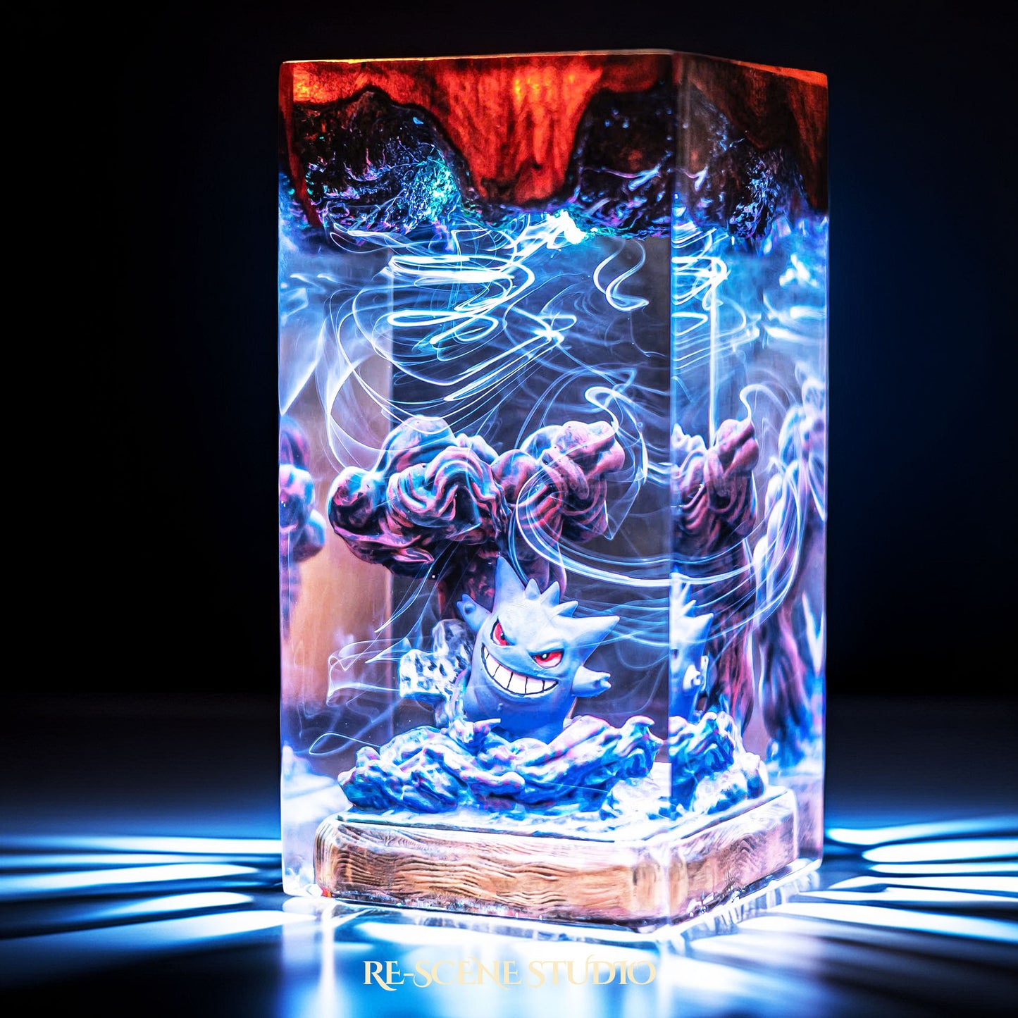 Grinning shadow phantom with a looming dark silhouette handmade epoxy resin LED lamp on a wooden base – angled side view