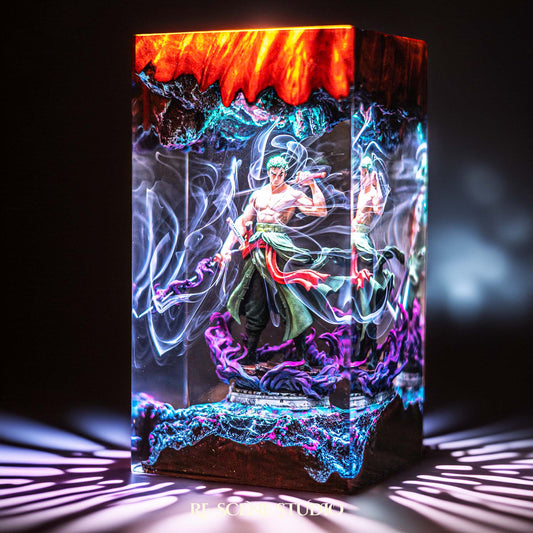 Green-clad three-sword swordsman mid-stance handmade epoxy resin LED lamp on a wooden base – front view, lit