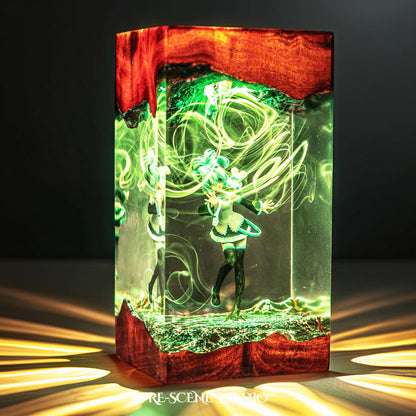 Teal twin-tailed virtual idol dancing handmade epoxy resin LED lamp on a wooden base – front view, lit