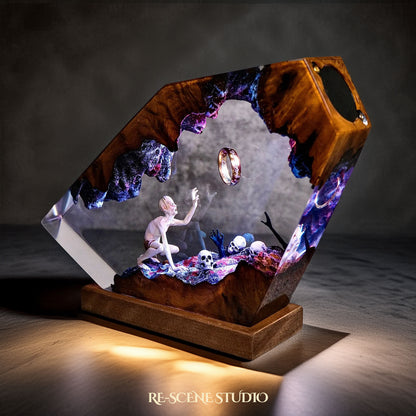 Top view of Gollum resin lamp on natural wood base