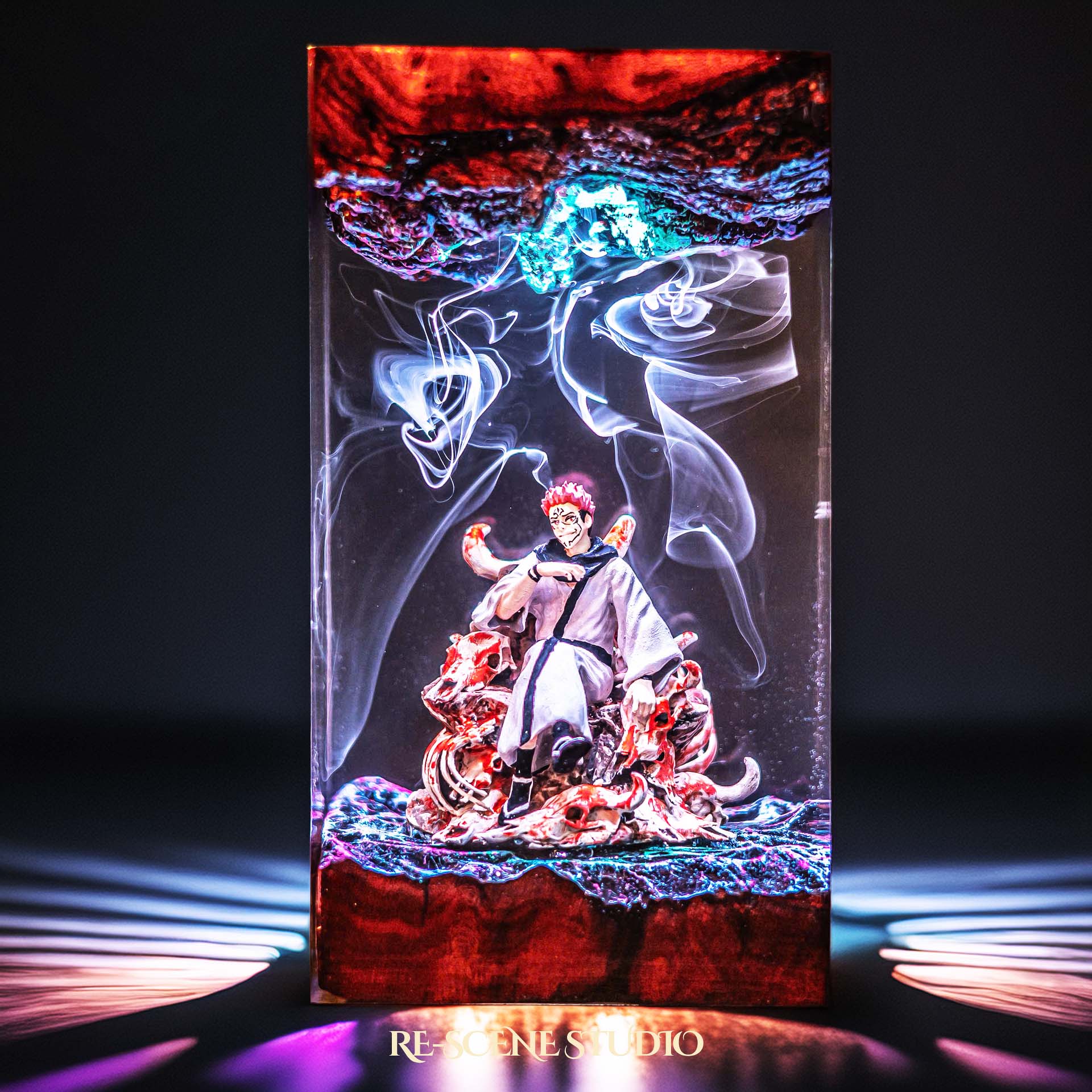 Red-haired curse king among a throne of skulls handmade epoxy resin LED lamp on a wooden base – angled side view