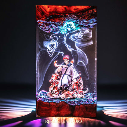 Red-haired curse king among a throne of skulls handmade epoxy resin LED lamp on a wooden base – angled side view