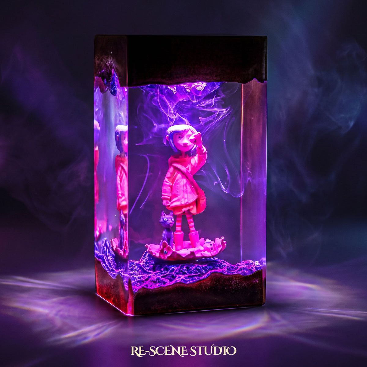 Coraline Resin Lamp V2 lit up in the dark, resin diorama lamp for desk or shelf