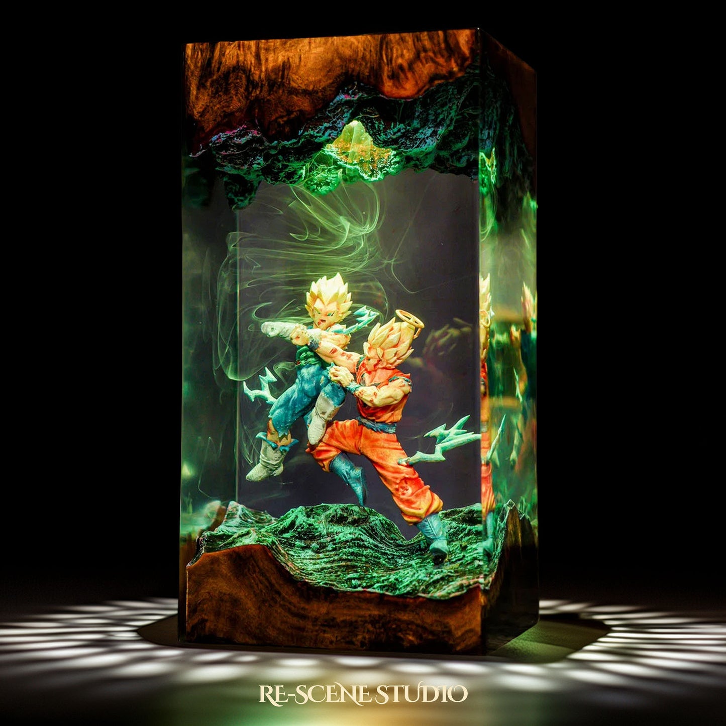 Top view of Goku vs Vegeta resin lamp on natural wood base