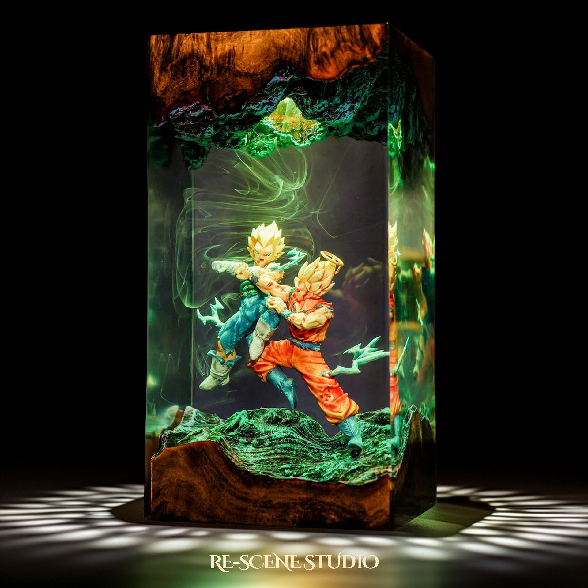 Top view of Goku vs Vegeta resin lamp on natural wood base