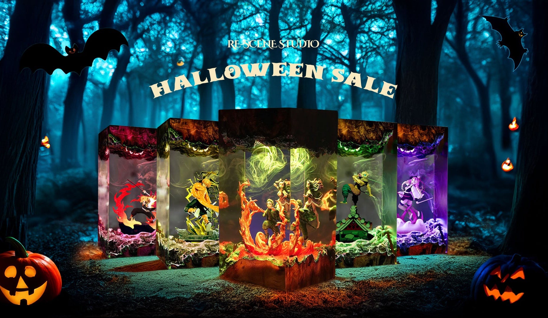 Halloween-themed display with glowing boxes in a forest setting, featuring 'Rene Studio' and 'Halloween Sale' text.