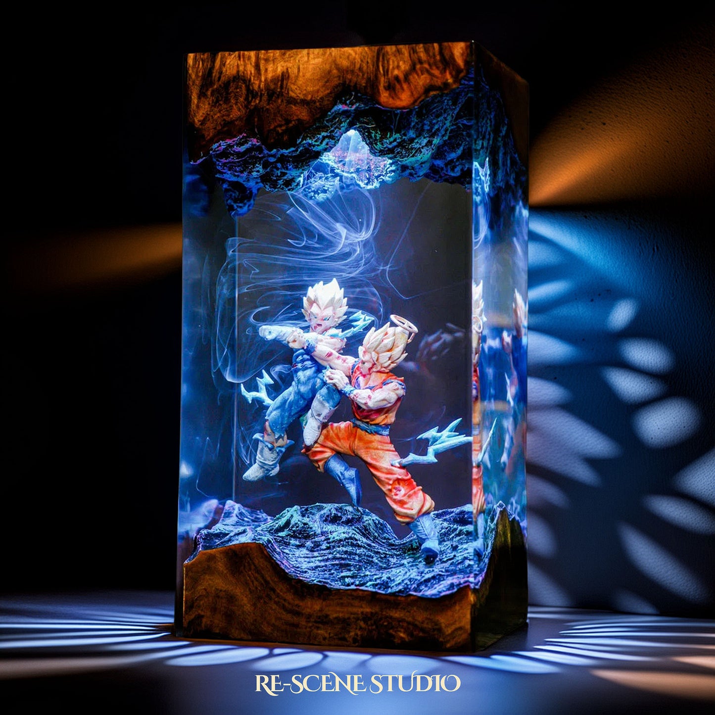 Goku vs Vegeta resin lamp lit at night with atmospheric mood glow