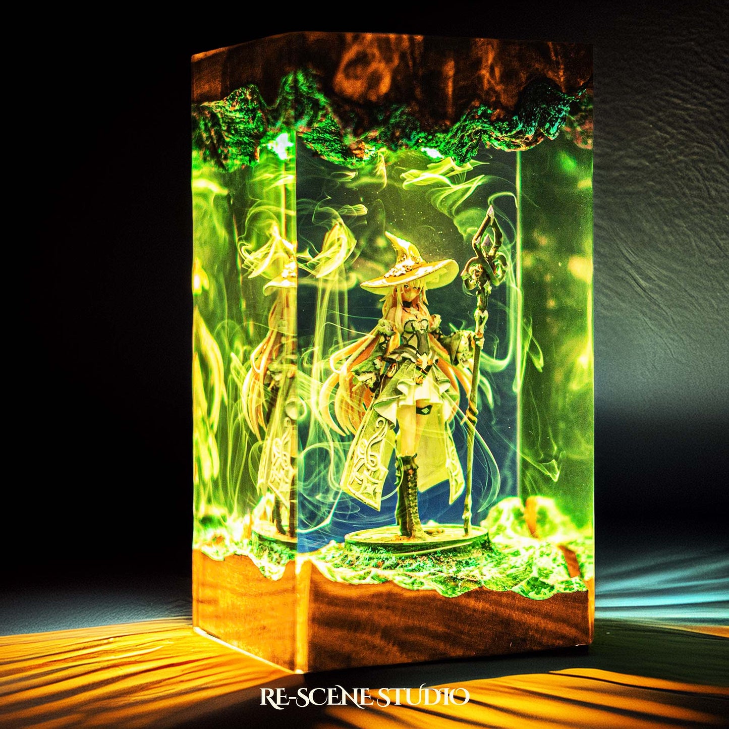Witch sorceress with a wide hat and glowing staff handmade epoxy resin LED lamp on a wooden base – RGB color glow in a dark room